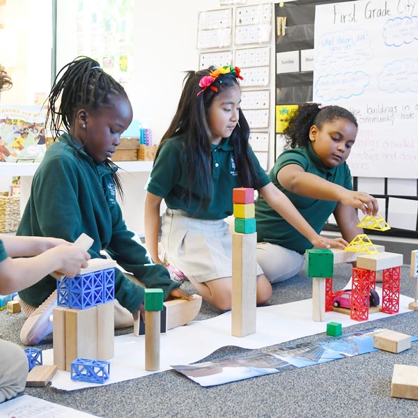 Elementary School Children Playing with Blocks