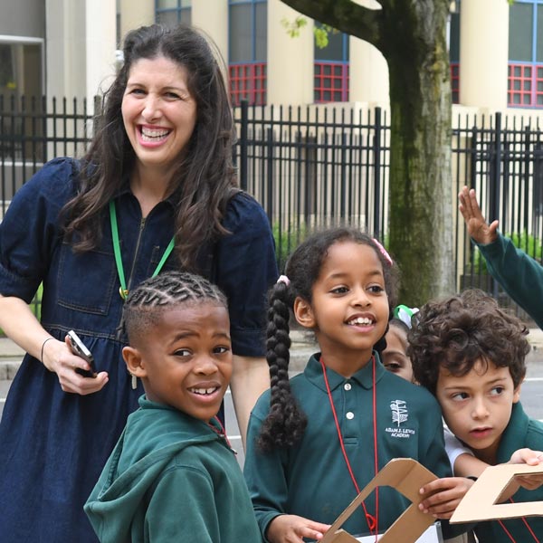Students Outdoors enjoying a Play based Learning Project